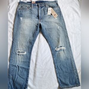 Distressed Blue Jeans